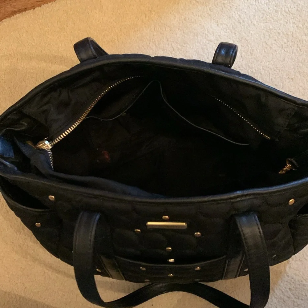 Rebecca Minkoff black and gold quilted baby bag